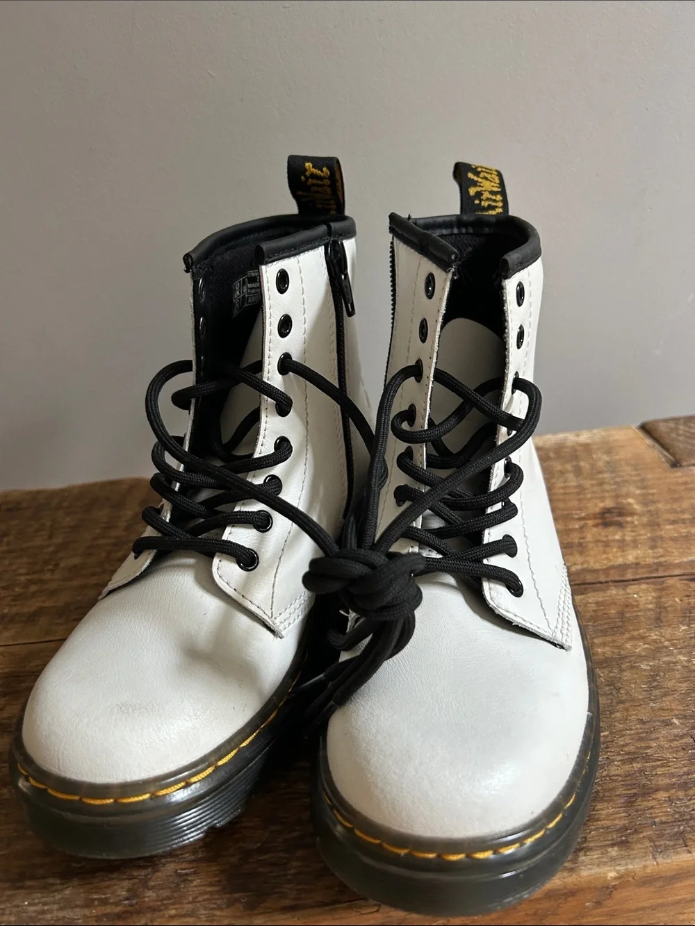 Dr. Martens White and Black Kids Lace-Up Combat Boots